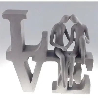 Sitting on Love Statue Statue
