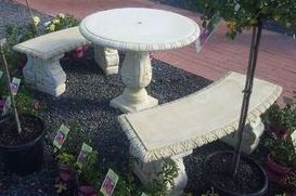 2 Tables and Curved Fancy Seats Outdoor Furniture