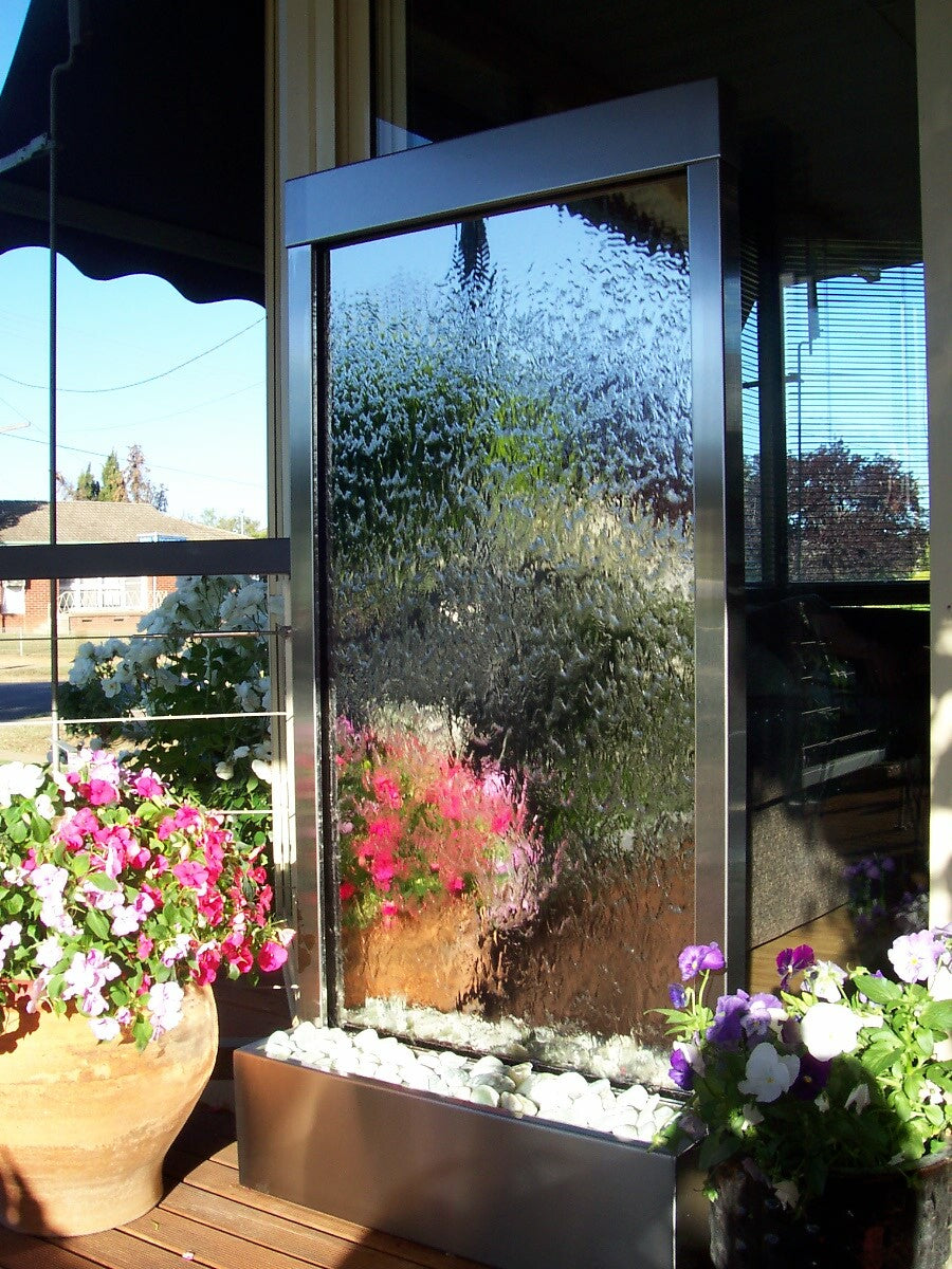 Alethia Water Wall Feature with flowers